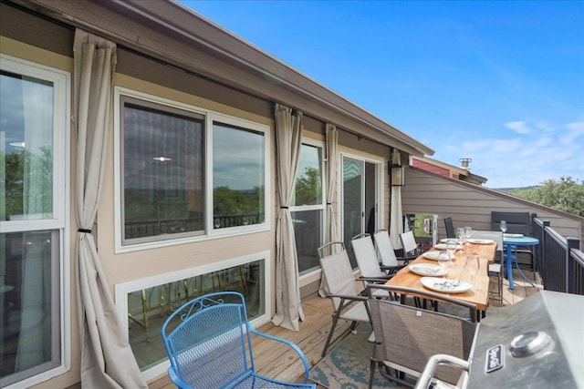 551 Demarett Dr Unit 4, Point Venture, TX 78645 - wooden terrace with outdoor dining space