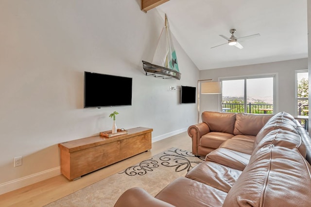 551 Demarett Dr Unit 4, Point Venture, TX 78645 - living area with lofted ceiling, baseboards, and ceiling fan