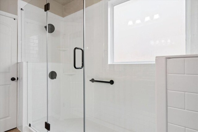 5627 Sabbia Dr, Round Rock, TX 78665 - bathroom featuring a shower stall