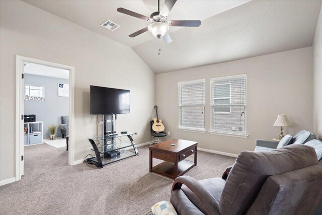 5627 Sabbia Dr, Round Rock, TX 78665 - carpeted living area featuring ceiling fan and lofted ceiling
