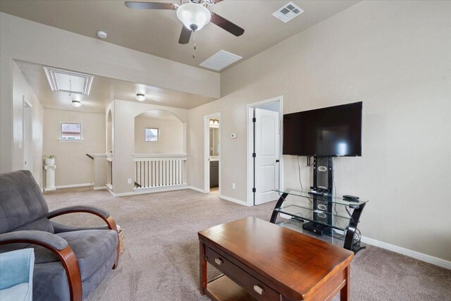 5627 Sabbia Dr, Round Rock, TX 78665 - living room featuring light carpet, attic access, and ceiling fan