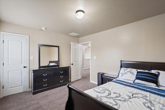 5627 Sabbia Dr, Round Rock, TX 78665 - bedroom with carpet floors and baseboards