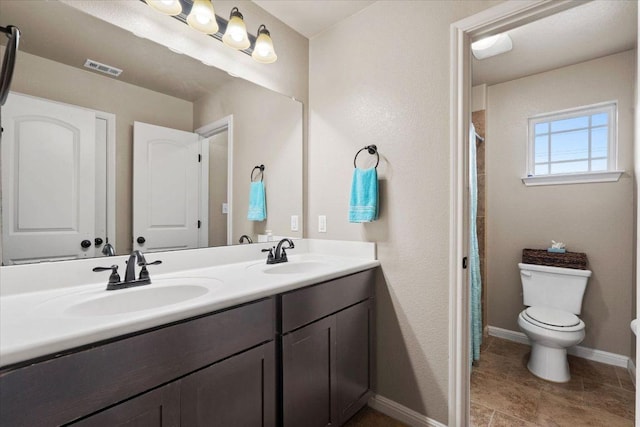 5627 Sabbia Dr, Round Rock, TX 78665 - full bathroom featuring double vanity and a shower with shower curtain