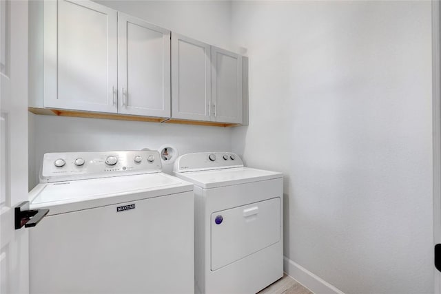 8414 Bowling Green Dr Unit 3, Austin, TX 78757 - washroom featuring washing machine and clothes dryer and cabinet space