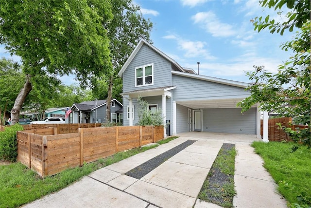8414 Bowling Green Dr Unit 3, Austin, TX 78757 - view of front of property featuring driveway and a carport