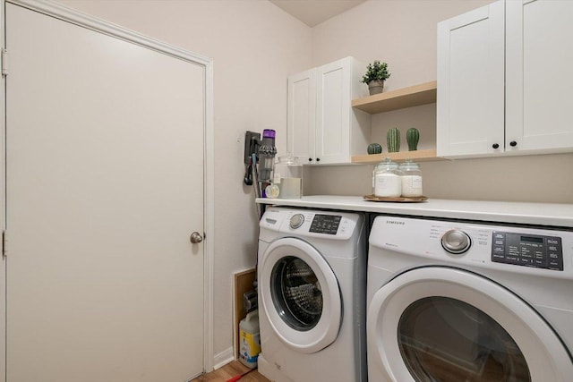 10204 Tildon Ave, Austin, TX 78754 - laundry area featuring cabinet space and separate washer and dryer
