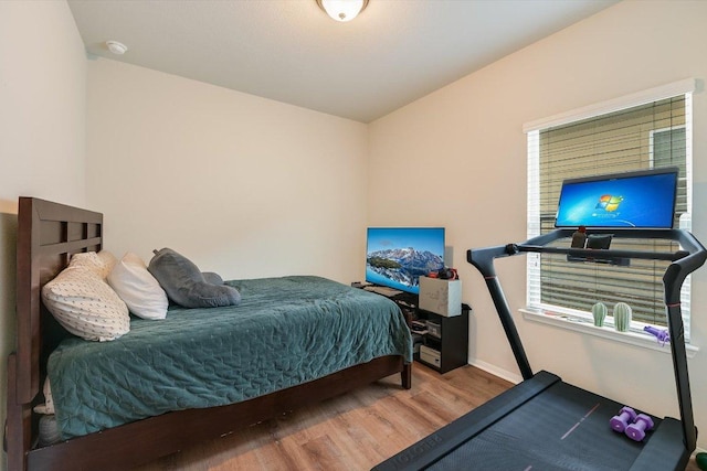 10204 Tildon Ave, Austin, TX 78754 - bedroom featuring wood finished floors and baseboards