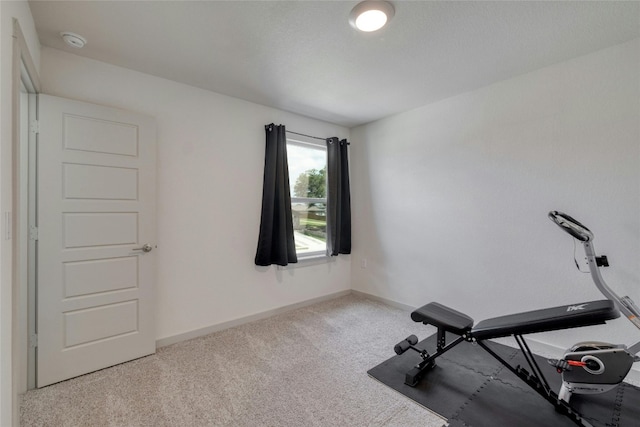 13901 Zuhause Dr, Pflugerville, TX 78660 - exercise room featuring carpet flooring and baseboards