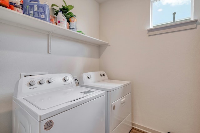13901 Zuhause Dr, Pflugerville, TX 78660 - laundry area with washer and clothes dryer