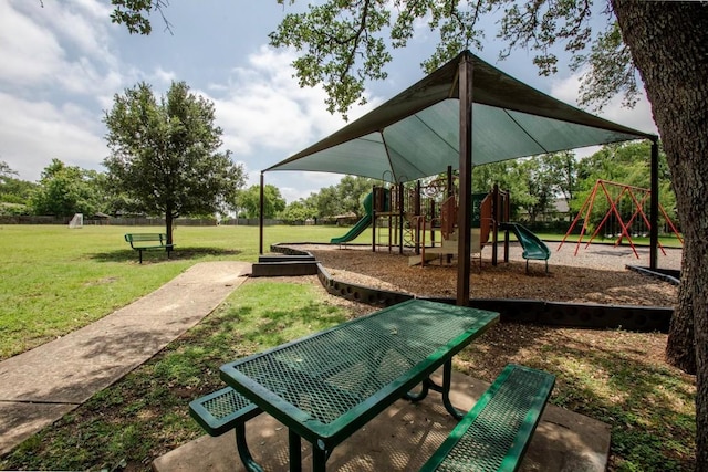 10802 Thicket Trl, Austin, TX 78750 - communal playground featuring a lawn