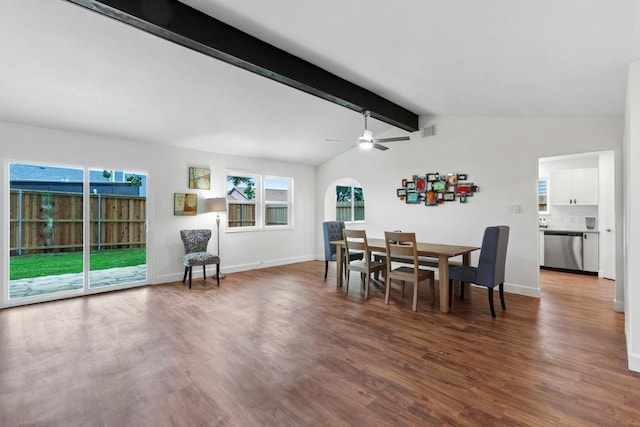 10802 Thicket Trl, Austin, TX 78750 - dining area featuring wood finished floors, baseboards, arched walkways, and a ceiling fan