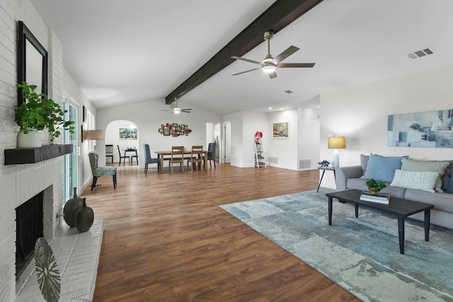 10802 Thicket Trl, Austin, TX 78750 - living room featuring a fireplace, a ceiling fan, wood finished floors, and baseboards