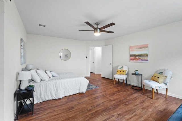 10802 Thicket Trl, Austin, TX 78750 - bedroom with wood finished floors, baseboards, and a ceiling fan