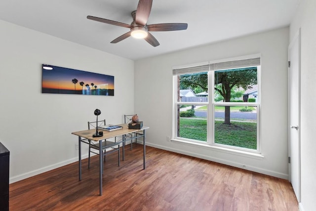 10802 Thicket Trl, Austin, TX 78750 - home office featuring a ceiling fan, wood finished floors, and baseboards