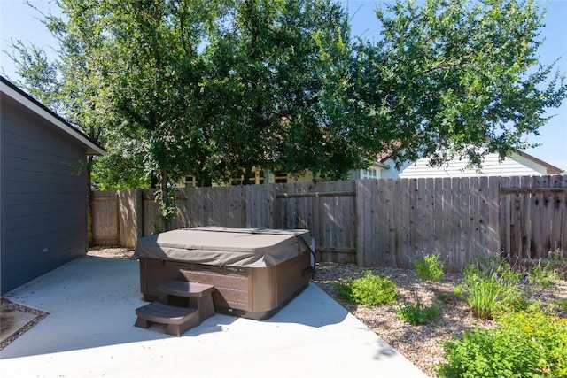 121 Split Oak Dr, Cedar Park, TX 78613 - fenced backyard featuring a hot tub and a patio area