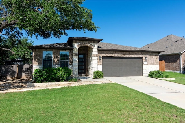 121 Split Oak Dr, Cedar Park, TX 78613 - view of front of property with an attached garage, driveway, brick siding, and stone siding