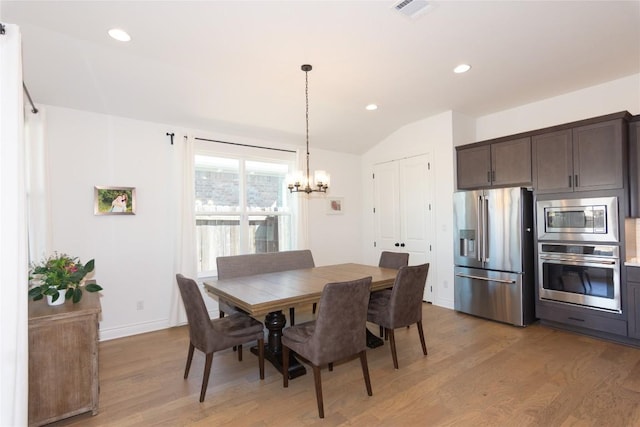 121 Split Oak Dr, Cedar Park, TX 78613 - dining room with light wood finished floors, a chandelier, vaulted ceiling, recessed lighting, and baseboards