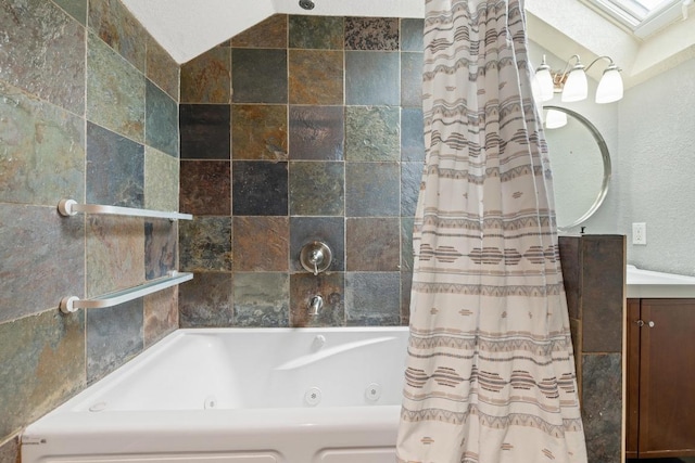 8888 Tallwood Dr Unit 1301, Austin, TX 78759 - full bath with vanity and a combined bath / shower with jetted tub