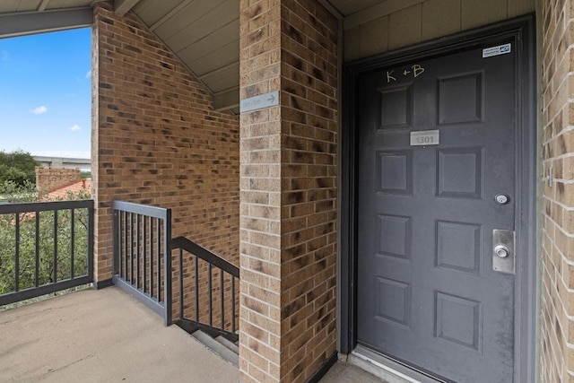 8888 Tallwood Dr Unit 1301, Austin, TX 78759 - view of exterior entry with brick siding
