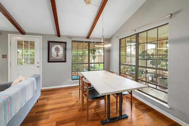 8701 Millway Dr, Austin, TX 78757 - dining space with healthy amount of natural light, wood finished floors, and baseboards