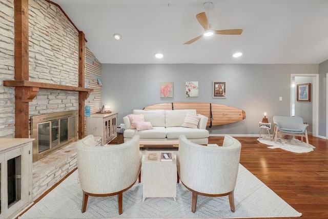 8701 Millway Dr, Austin, TX 78757 - living area featuring ceiling fan, wood finished floors, a fireplace, baseboards, and recessed lighting
