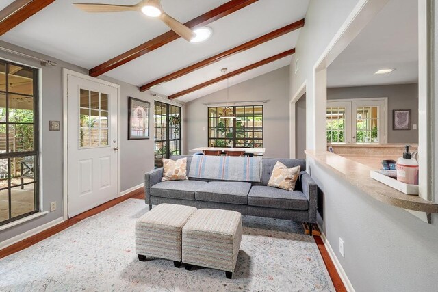 8701 Millway Dr, Austin, TX 78757 - living room featuring plenty of natural light, wood finished floors, ceiling fan, and baseboards