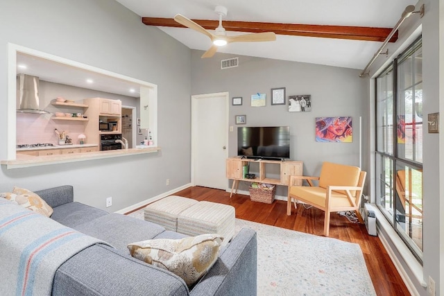 8701 Millway Dr, Austin, TX 78757 - living area featuring beam ceiling, ceiling fan, baseboards, wood finished floors, and recessed lighting