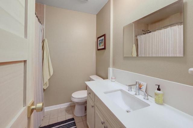 8701 Millway Dr, Austin, TX 78757 - bathroom with toilet, vanity, and tile patterned floors