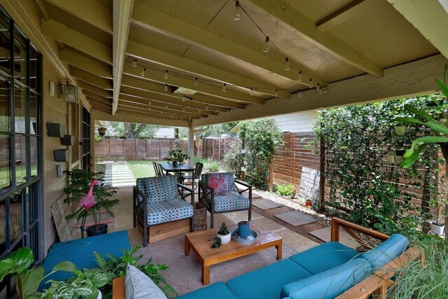 8701 Millway Dr, Austin, TX 78757 - fenced backyard featuring an outdoor hangout area, a patio, and outdoor dining area