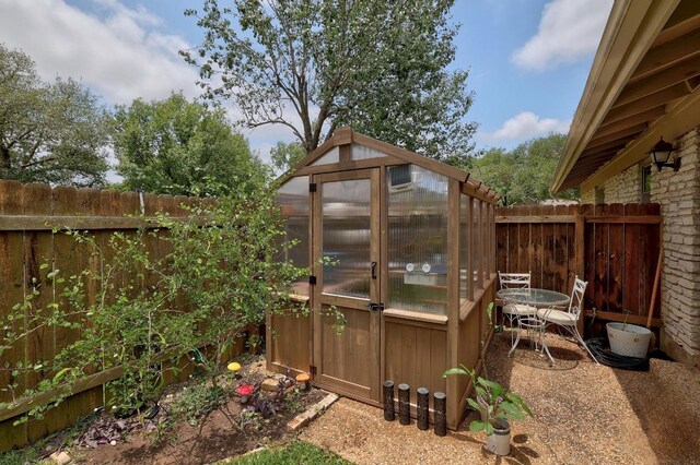 8701 Millway Dr, Austin, TX 78757 - view of greenhouse with a fenced backyard