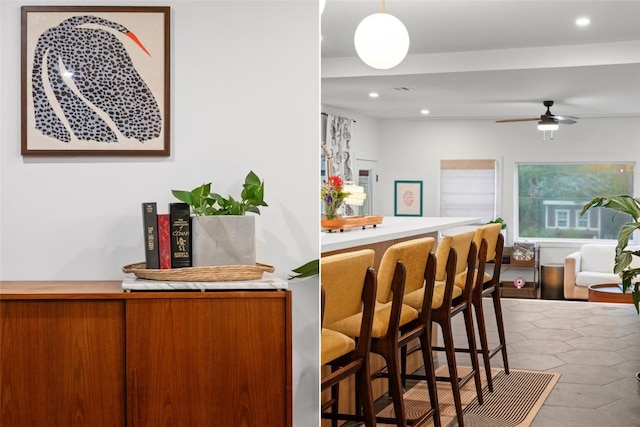 109 W 55th 1/2 St, Austin, TX 78751 - bar area featuring ceiling fan, recessed lighting, and tile patterned floors