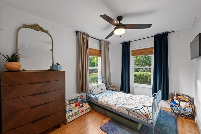 109 W 55th 1/2 St, Austin, TX 78751 - bedroom featuring wood finished floors and ceiling fan