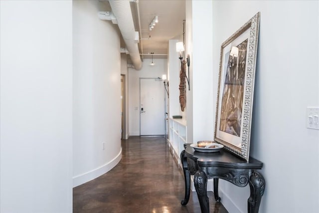 311 W 5th St W Unit 902, Austin, TX 78701 - corridor with concrete flooring and baseboards