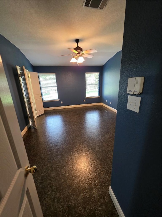 3401 Kissman Dr, Austin, TX 78728 - empty room with baseboards and ceiling fan