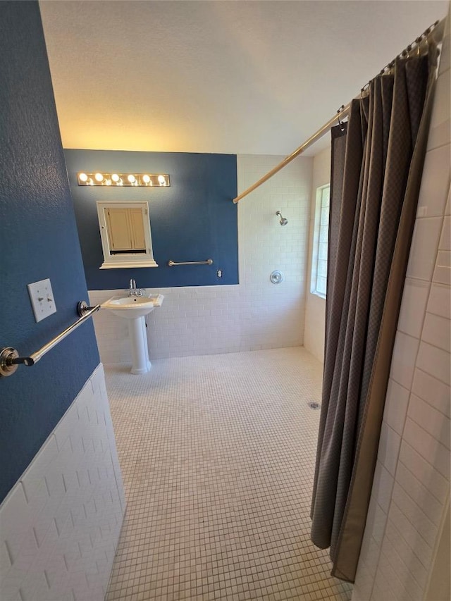 3401 Kissman Dr, Austin, TX 78728 - full bath featuring tiled shower and tile patterned flooring