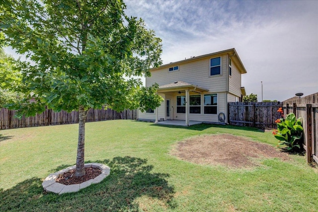1519 Shenandoah Cv, Lockhart, TX 78644 - back of property featuring a patio area and ceiling fan