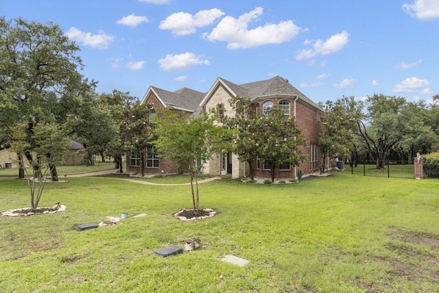 15 Sarazen Loop N, Georgetown, TX 78628 - view of front of house featuring brick siding