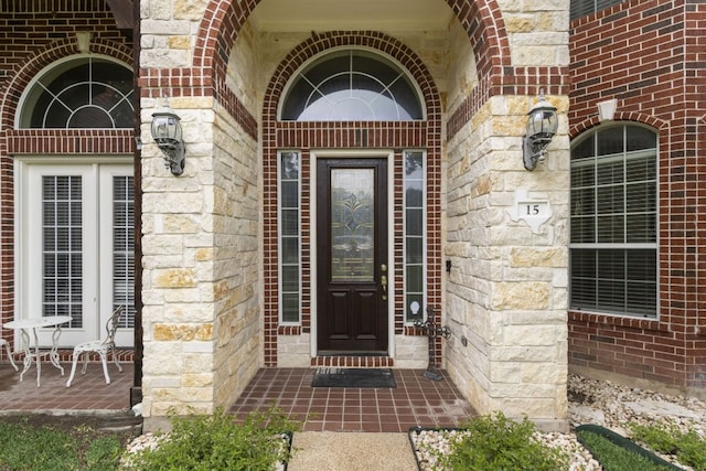 15 Sarazen Loop N, Georgetown, TX 78628 - entrance to property featuring brick siding and stone siding