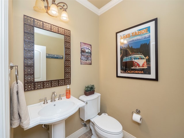 104 E Rustle Cv, Georgetown, TX 78628 - bathroom featuring toilet, ornamental molding, baseboards, a chandelier, and tile patterned flooring