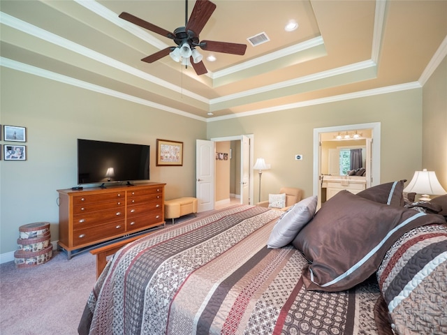 104 E Rustle Cv, Georgetown, TX 78628 - bedroom with a tray ceiling, crown molding, carpet flooring, baseboards, and ensuite bath