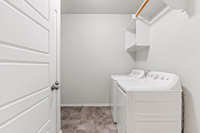1012 Chad Loop, Round Rock, TX 78665 - laundry area featuring washer and dryer and baseboards