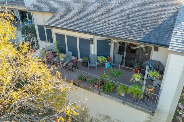 1520 Ben Crenshaw Way Unit 120, Austin, TX 78746 - rear view of house featuring a shingled roof and ceiling fan
