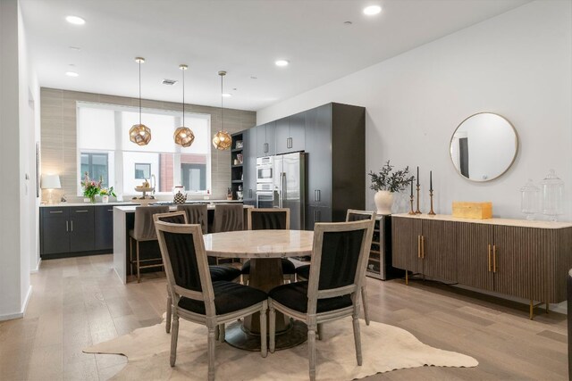3100 Menchaca Rd Unit 33, Austin, TX 78704 - dining space featuring light wood-type flooring and recessed lighting