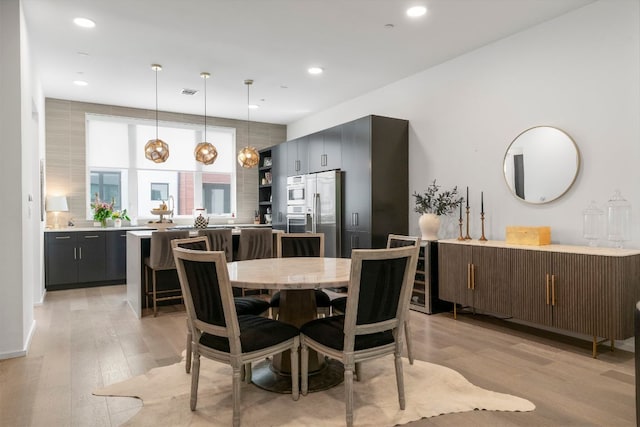 3100 Menchaca Rd Unit 33, Austin, TX 78704 - dining room with light wood-style floors and recessed lighting