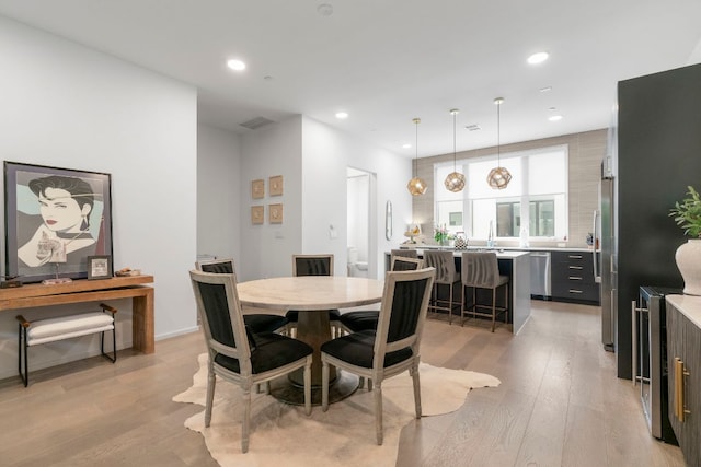 3100 Menchaca Rd Unit 33, Austin, TX 78704 - dining area with light wood-type flooring and recessed lighting