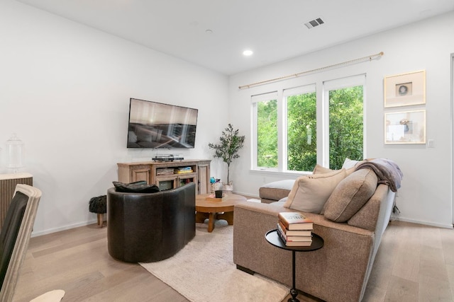 3100 Menchaca Rd Unit 33, Austin, TX 78704 - living area with light wood-type flooring, baseboards, and recessed lighting