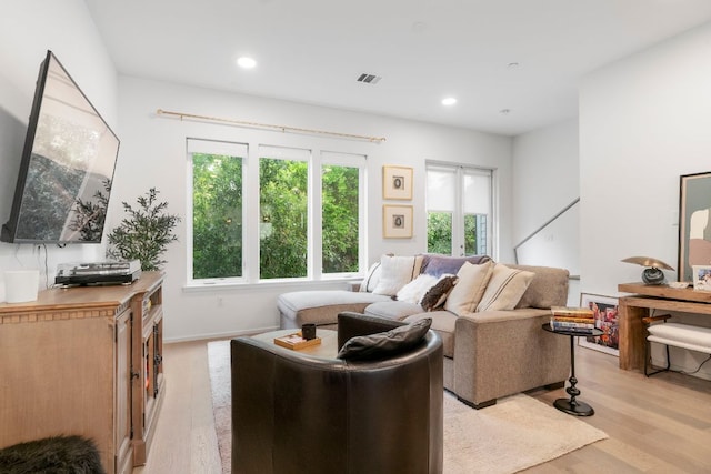 3100 Menchaca Rd Unit 33, Austin, TX 78704 - living room with light wood-style flooring and recessed lighting