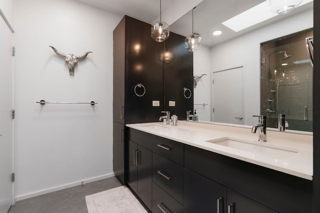 3100 Menchaca Rd Unit 33, Austin, TX 78704 - full bath with double vanity, a shower stall, a skylight, tile patterned floors, and recessed lighting