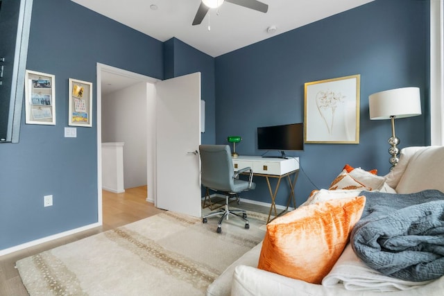3100 Menchaca Rd Unit 33, Austin, TX 78704 - office featuring a ceiling fan, baseboards, and wood finished floors