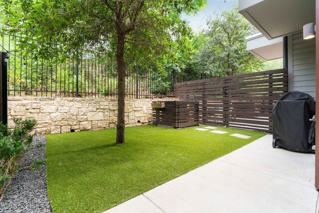 3100 Menchaca Rd Unit 33, Austin, TX 78704 - view of yard with a patio